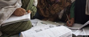 An adult literacy class, at Dust-e-Noor neighborhood, in Mazar-e-Sharif, in the northern province of Balkh. Dari is the Afghan dialect of the Persian or Farsi language. A total of 50 women attend the literacy centre, one of 7,000 such centers in the province. Nationwide, 48,000 women participate in the literacy program. Afghanistan. June 28, 2007. (Photo by: Majority World/UIG via Getty Images) 