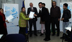 Awarding Certificates of participation in the Educational Workshop